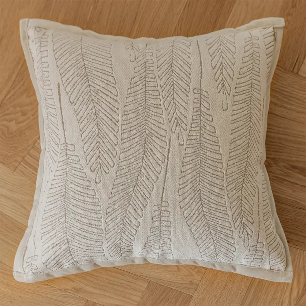 Beige pillow covers with embroidered gray fern patterns in french cream jacquard for decorbites living room decor
