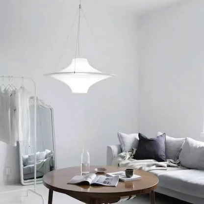 A sleek white ceramic pendant with disc-shaped design illuminates dining room decorbites french cream chandelier