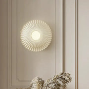 Cream-colored petal-shaped french cream wall lamp with central circular light fixture for bedroom decorbites french cream wind