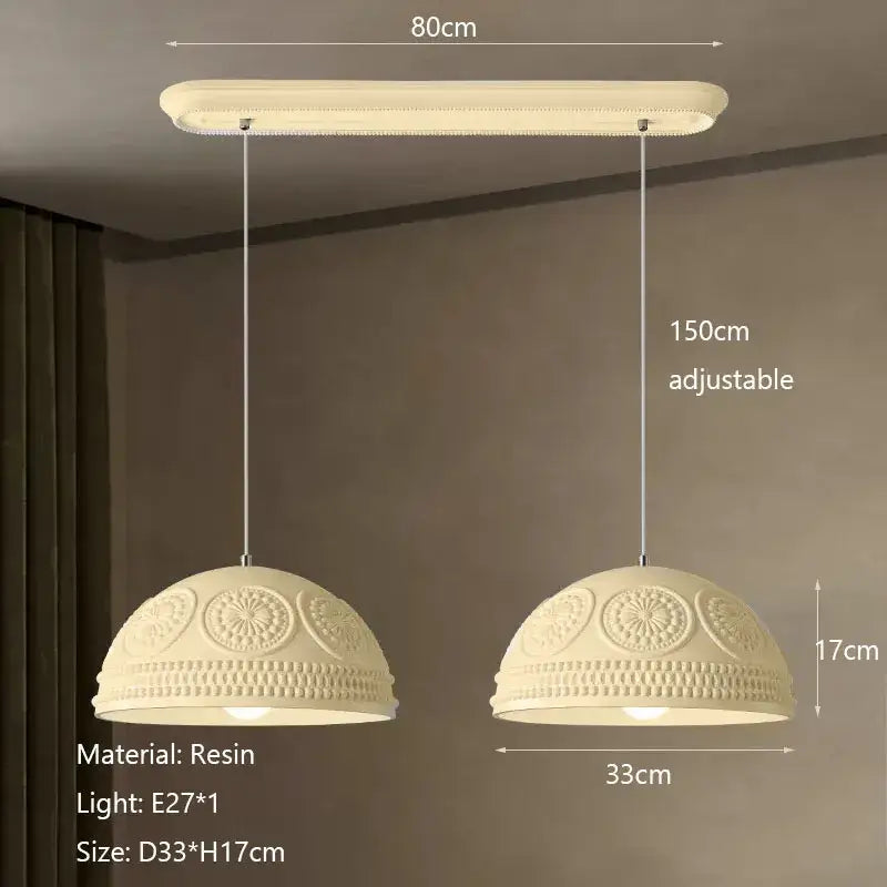 Cream-colored resin pendant light with intricate floral and beaded patterns in decorbites french cream style led chandelier