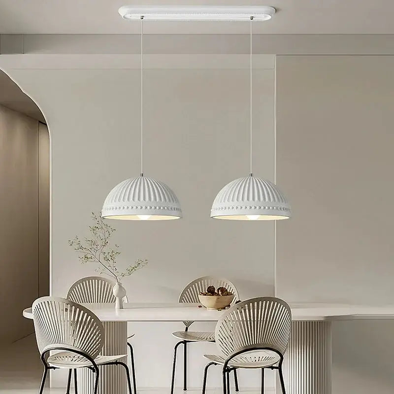 Two white ribbed pendant lights with beaded detailing in decorbites french cream style led chandelier for dining room