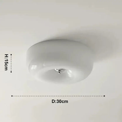 A sleek french cream ceiling lamp with translucent frosted glass and chrome mounting for bedroom decorbites french cream