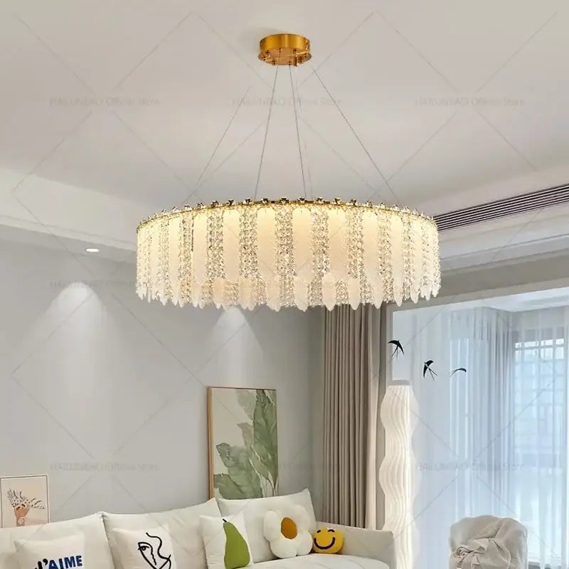 Gold-toned circular french cream wind crystal chandelier with cascading teardrop pendants for living room decorbites french cream