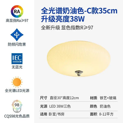 Cream-colored oval ceiling lamp with textured ribbed glass shade and metallic iron frame for bedroom decorbites cream wind