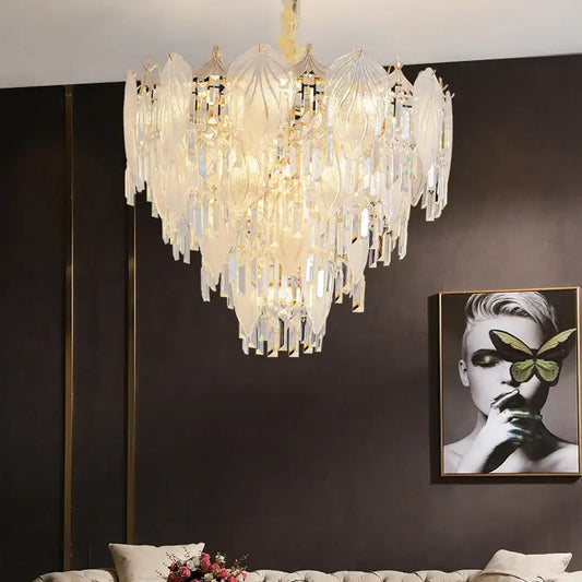 A luxurious cream french crystal chandelier pendant light with layered leaf glass and dangling clear crystals for dining room decorbites french crystal