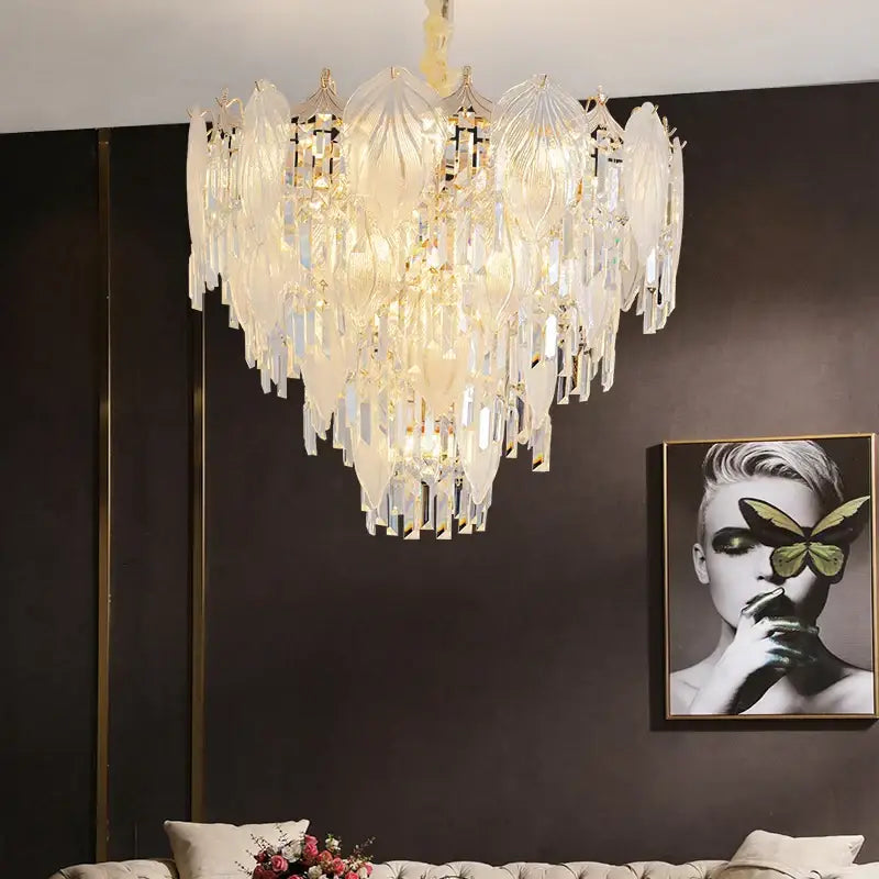 A luxurious cream french crystal chandelier pendant light with layered leaf glass and dangling clear crystals for dining room decorbites french crystal