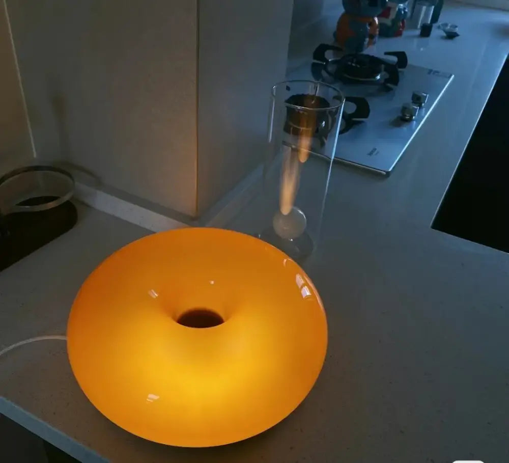 Vibrant orange glossy resin decorbites french decorative wall lamp with circular donut shape for bedroom bedside lighting