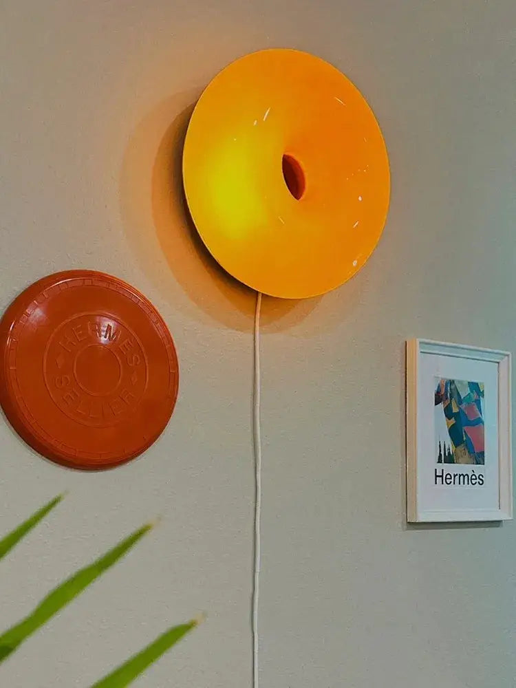 Vibrant orange glossy decorbites french decorative wall lamp with illuminated central hole for bedroom bedside lighting