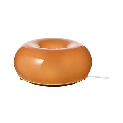 A sleek translucent amber french decorative wall lamp with a glossy finish and power cord for bedside decorbites wall lamps