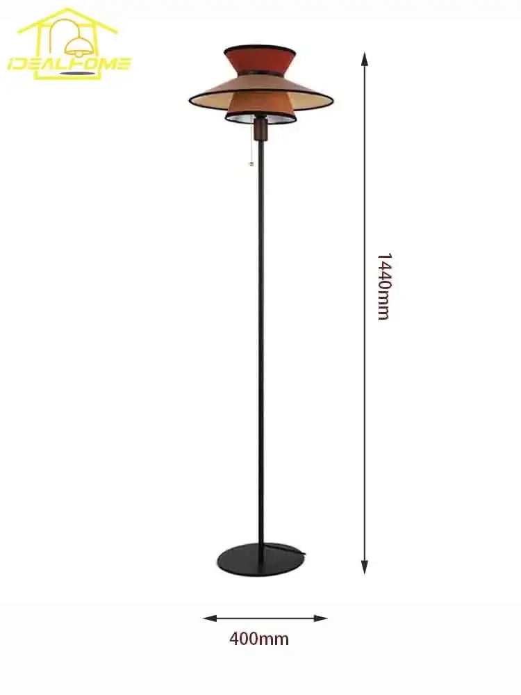Black metal floor lamp with tiered conical amber shade for living room decorbites french design vertical style