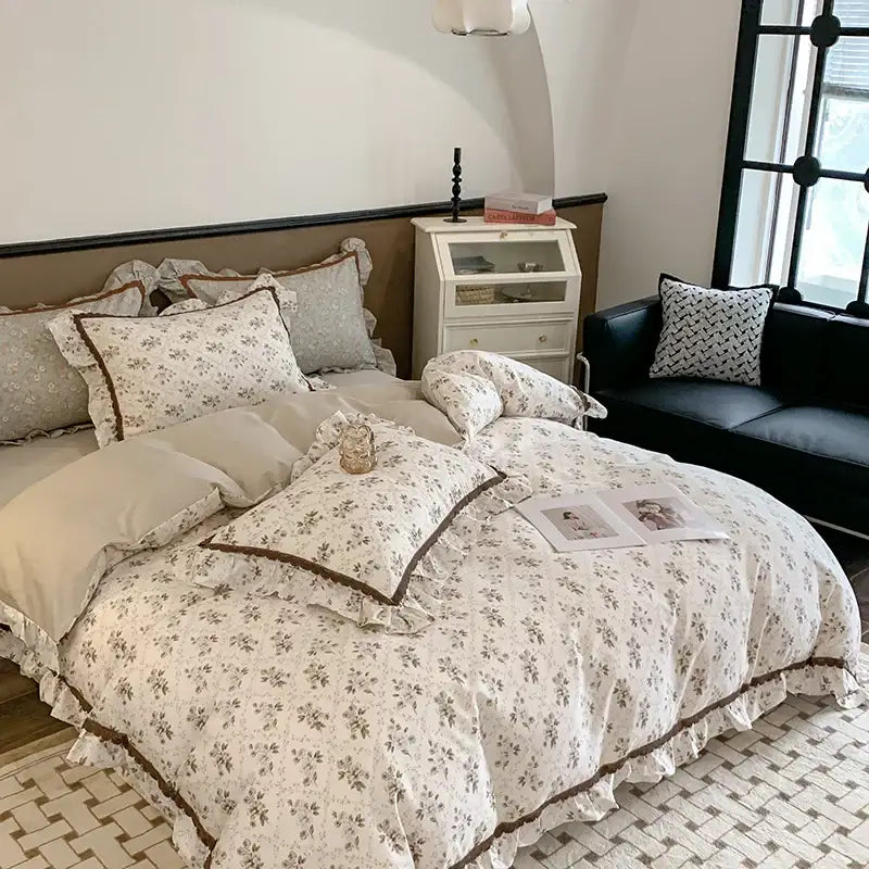 Cream-colored french floral bedding set with delicate ruffles and brown trim for elegant bedroom decorbites french floral decor