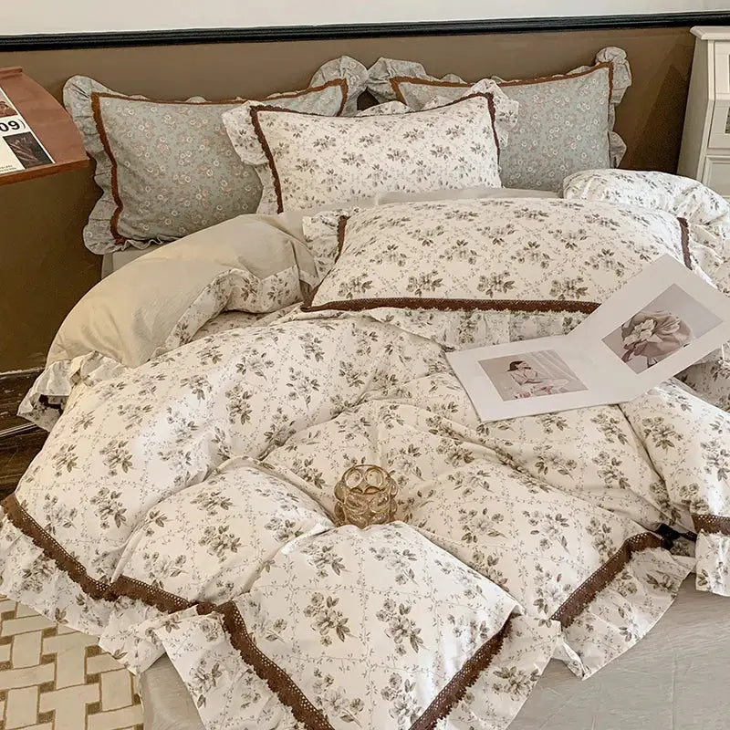 Floral-patterned bedding set with delicate ruffles and brown trim in decorbites french floral cream and brown decor