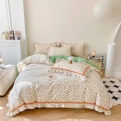 Cream-colored french floral bedding set with delicate orange trim and ruffled edges for decorbites french floral decor