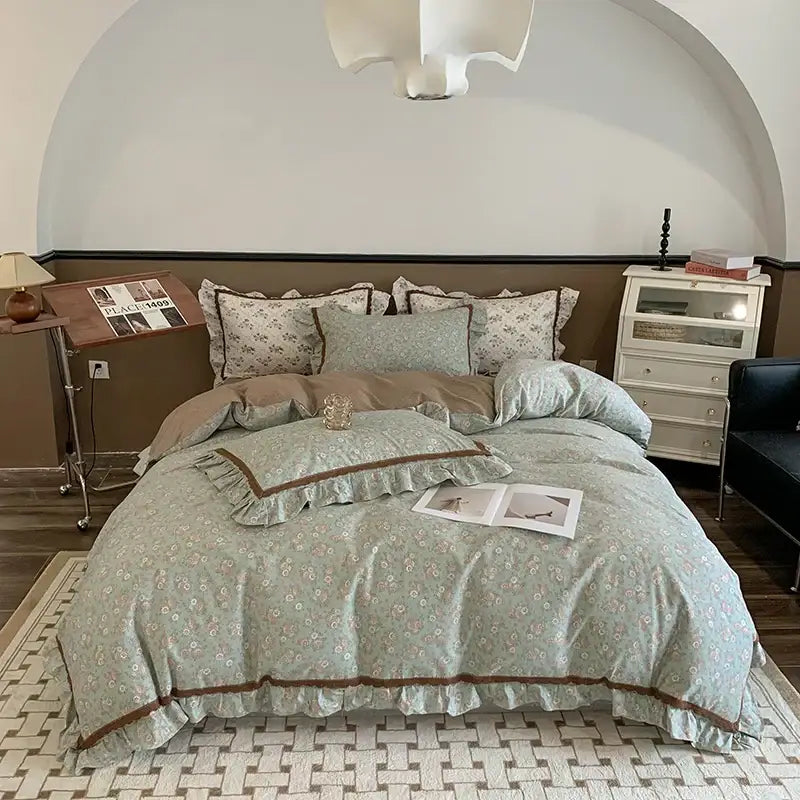 Light green french floral bedding set with delicate ruffled edges and brown trim by decorbites for elegant bedroom decor