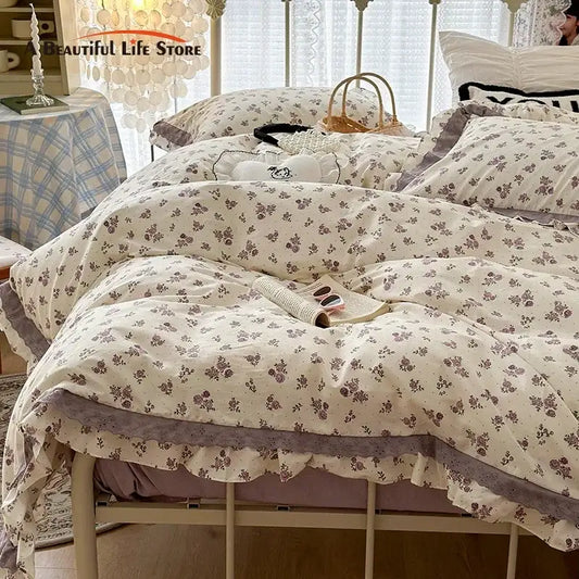Cream-colored floral bedding set with delicate purple double layer lace and ruffles for bedroom decor