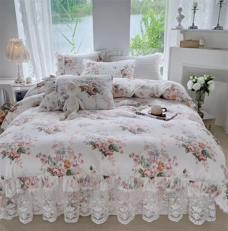 White floral bedding set with delicate lace trim and pastel pink peach blue blossoms in decorbites french floral print