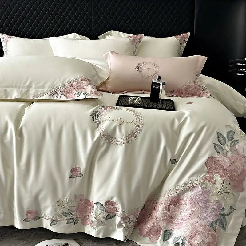 Cream-colored satin duvet cover with pink rose embroidery and lace trim from decorbites french flowers embroidery bedding set