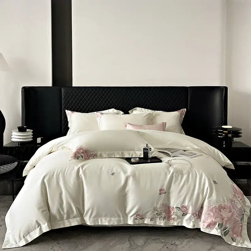 Cream-colored satin bedding set with delicate pink french flowers embroidery and subtle sheen luxury cotton decorbites french flowers