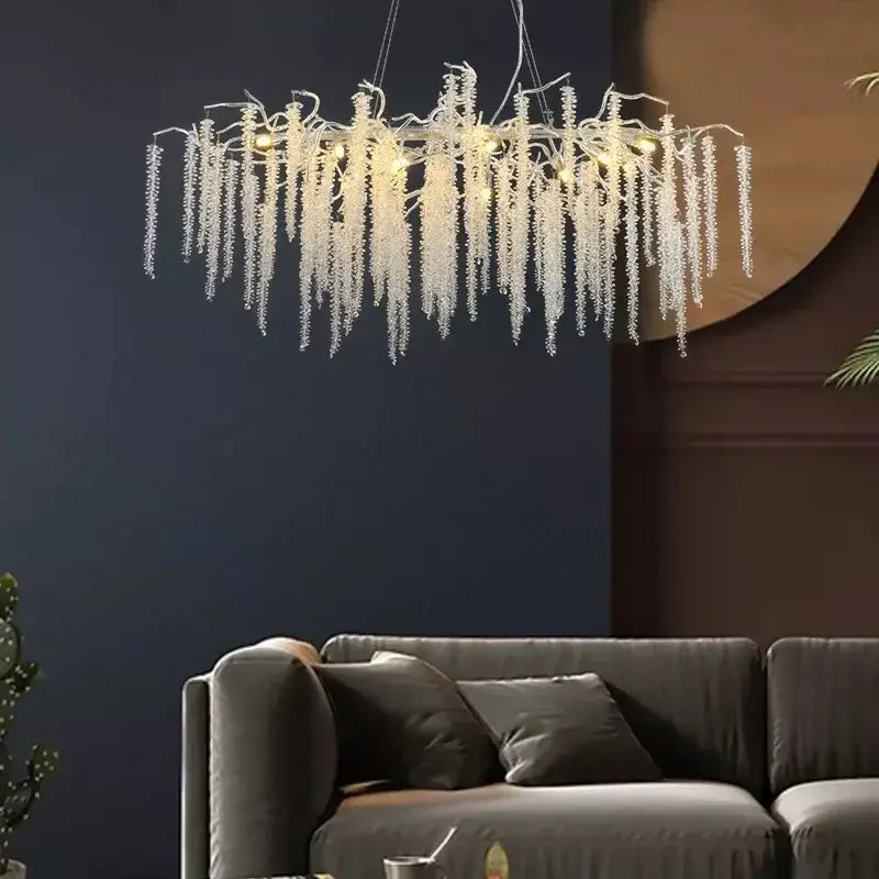 French golden crystal branch chandelier featuring translucent icicle strands with warm led lights by decorbites crystal branch