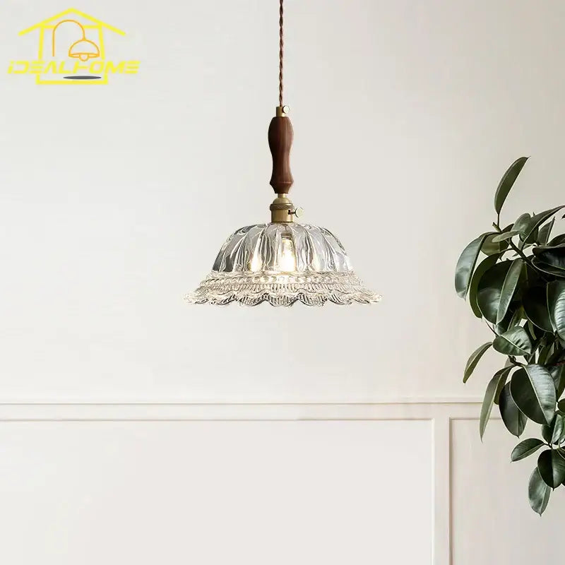 Clear glass pendant lights with fluted ruffled design and dark wood handle for french ins walnut decorbites kitchen island