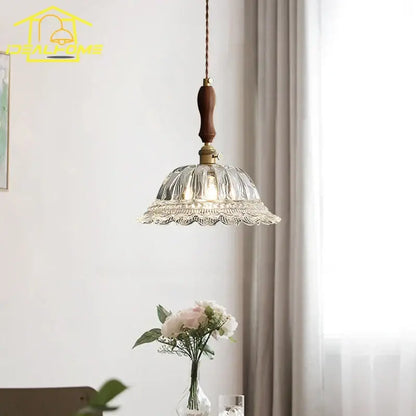 Clear glass pendant lights with walnut wooden handle and brass accents from decorbites french ins for kitchen island decor