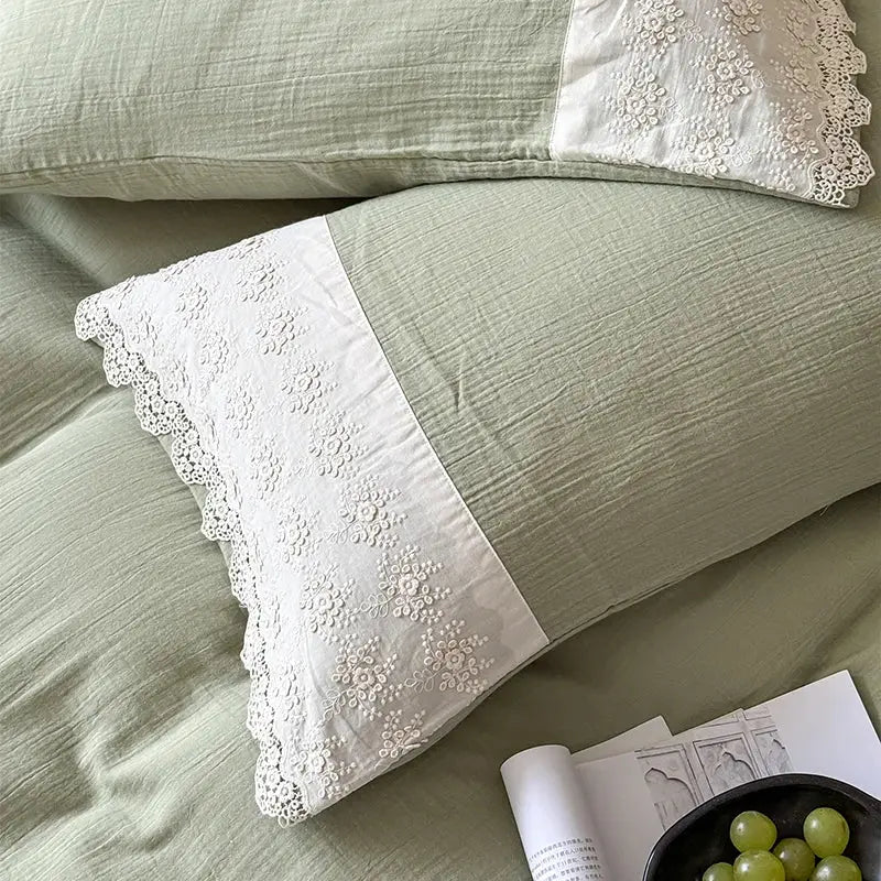 A soft sage green french lace cotton pillowcase with white embroidered floral trim from decorbites bedding set