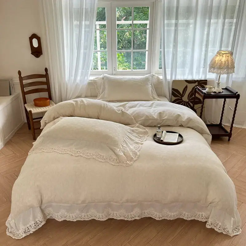 Cream-colored bedding set with delicate white lace trim and ruffled corners in decorbites jacquard linen cotton