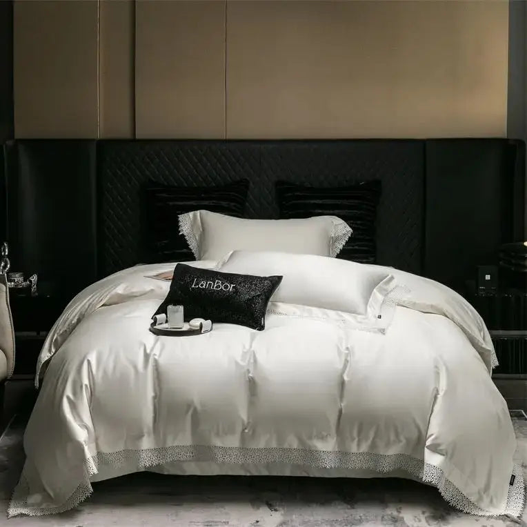 Luxurious white satin bedding set with french lace edge silver trim and lanbor brand embroidery by decorbites french lace