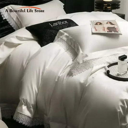 White satin duvet cover bedding set with delicate silver french lace edge and black lanbor logo pillow decorbites french lace