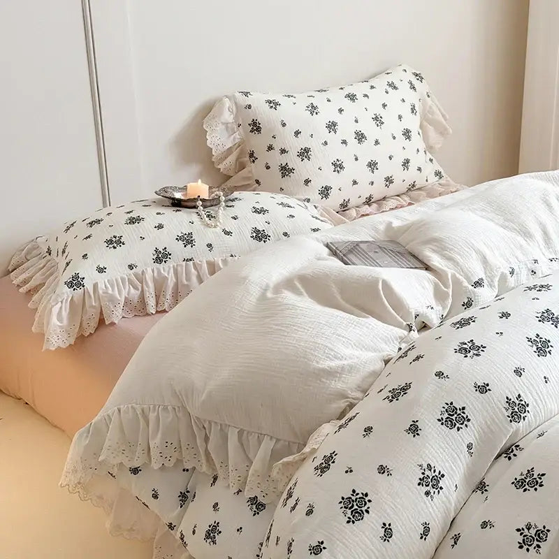 White cotton pillowcases with black french lace floral patterns and delicate ruffles from decorbites bedding set
