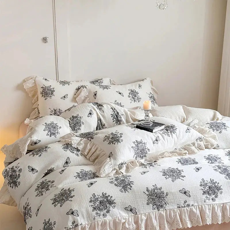 White and gray floral-patterned cotton bedding set with delicate ruffled edges decorbites french lace floral design