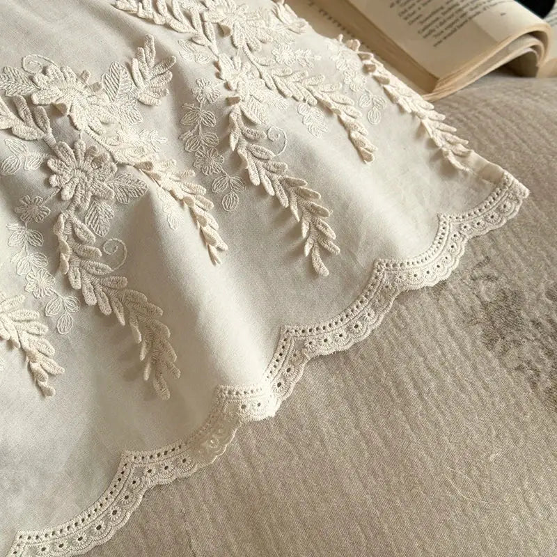 Cream cotton bedding set featuring delicate french lace flowers embroidery and scalloped lace trim for bedroom use