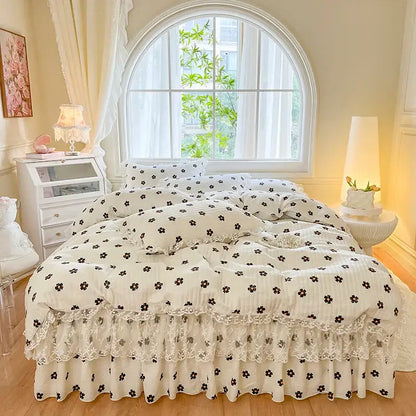 Cream-colored bedding set with black floral patterns and delicate french lace ruffles for decorbites french lace decor