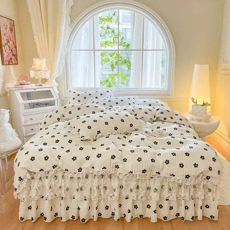Cream-colored bedding set with black floral patterns and delicate french lace ruffles for decorbites french lace decor