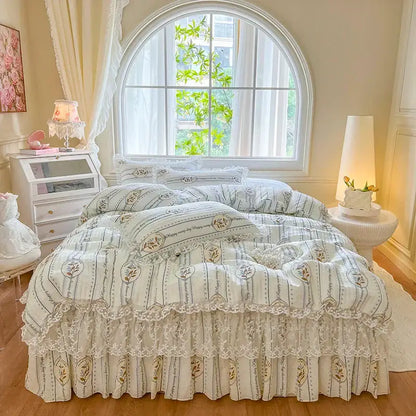 Cream-colored bedding set with delicate lace trim and vintage floral pattern in soft gray and gold by decorbites french lace ruffles