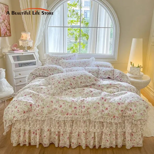 A delicate cream floral bedding set with lace trim and ruffled edges featuring decorbites french lace ruffles