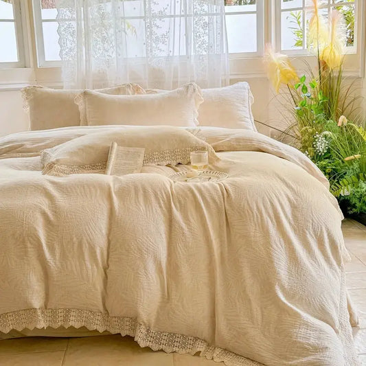 Cream-colored linen bedding set with delicate french lace ruffles trim for elegant bedroom decor by decorbites french lace