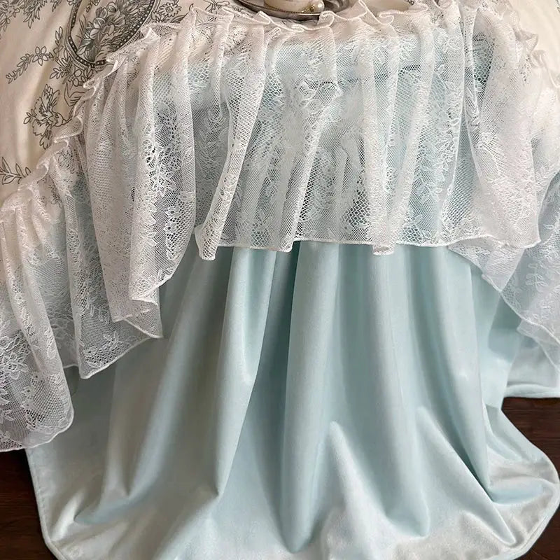 A french lace ruffles bedding set featuring delicate white lace over light blue satin for elegant decorbites french lace decor