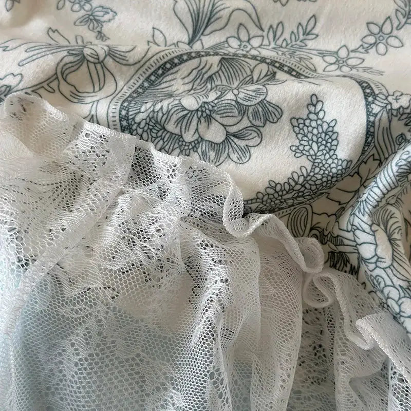 White lace ruffle with intricate mesh pattern on light blue and white french lace ruffles bedding set decorbites