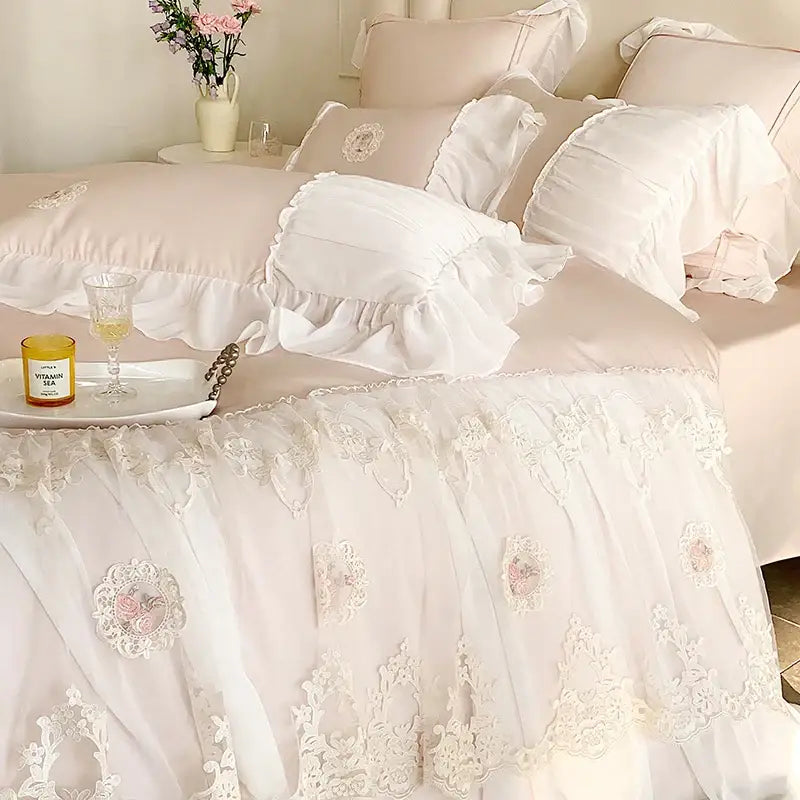 A delicate white French lace ruffles bedding set with intricate floral embroidery and ruffled edges for decorbites bedroom decor