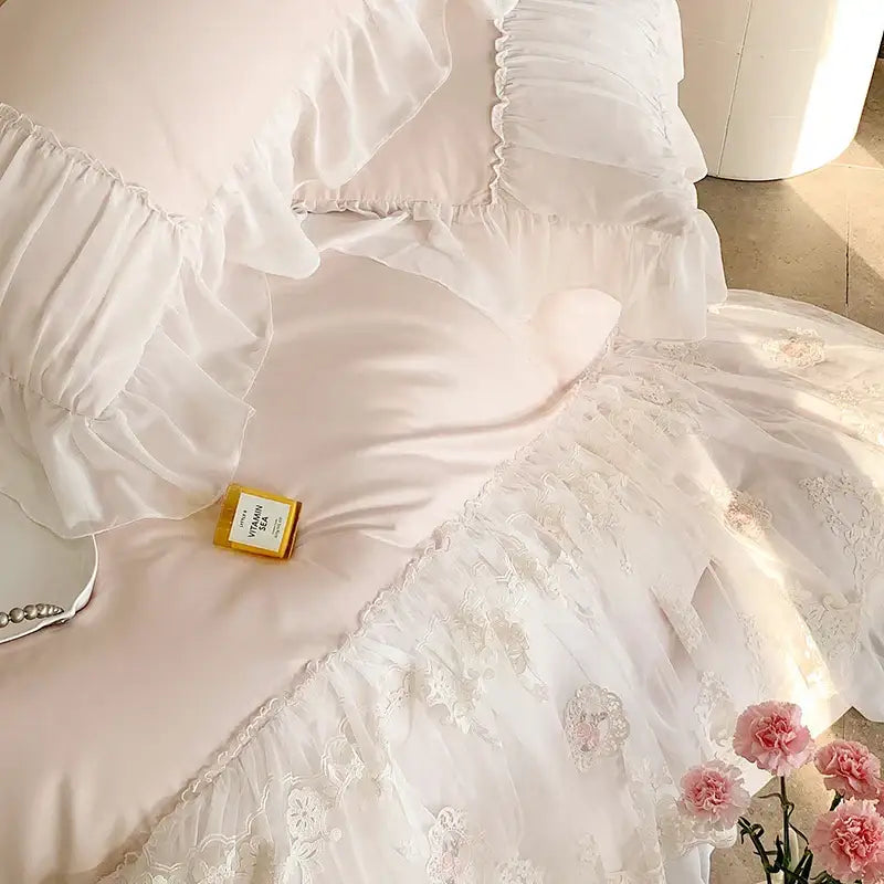 A delicate white cotton bedding set with french lace ruffles and floral embroidery for decorbites french lace decor