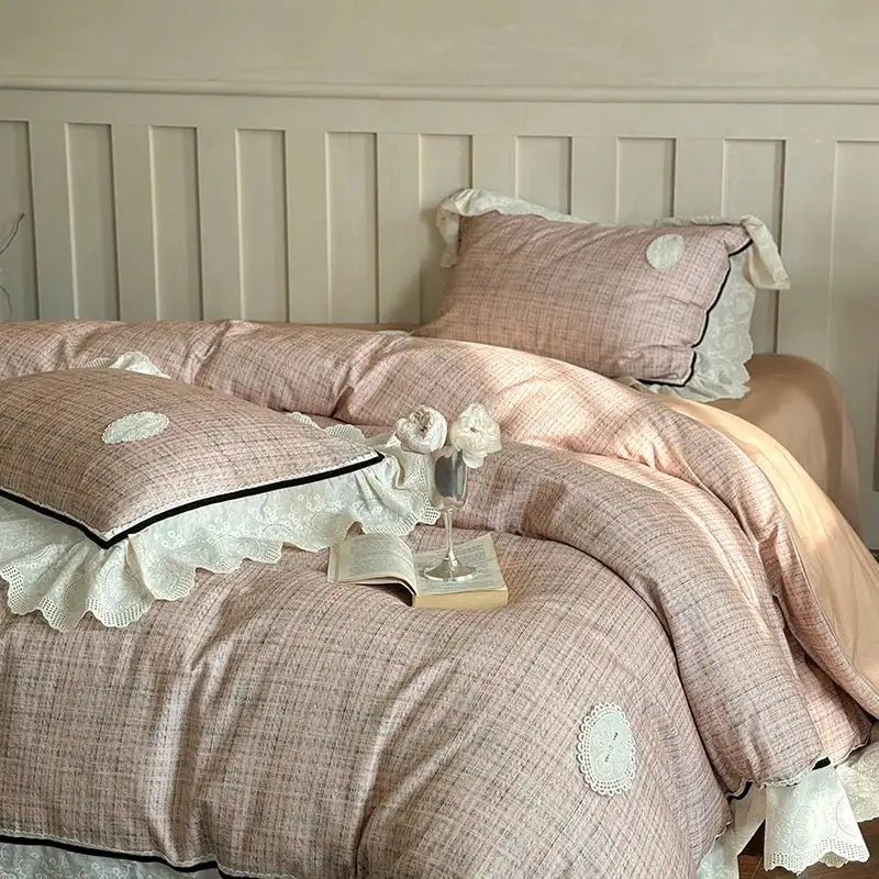 Pink textured duvet bedding set with white lace ruffles and embroidered details in egyptian cotton by decorbites french lace