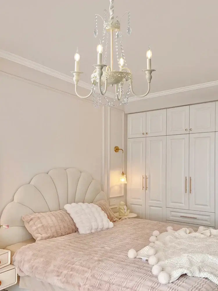 A delicate white crystal chandelier with crystal accents for living room decorbites french light luxury style