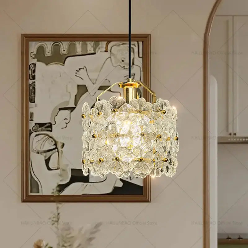 Gold-toned french light luxury bedroom pendant light with clear glass flower petals cascade by decorbites french light