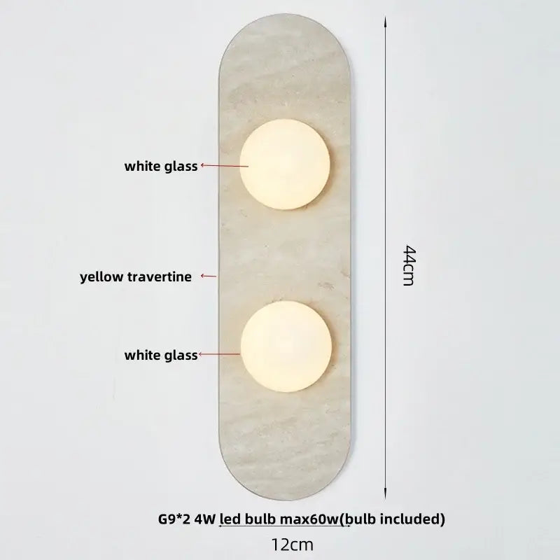 Modern wall light with two white glass bulbs on a yellow travertine panel by decorbites led wall light