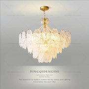 Elegant gold-toned decorbites cream crystal chandelier with cascading clear intricately cut crystals for living room light