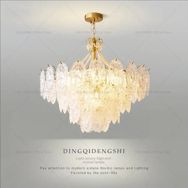 Elegant gold-toned decorbites cream crystal chandelier with cascading clear intricately cut crystals for living room light