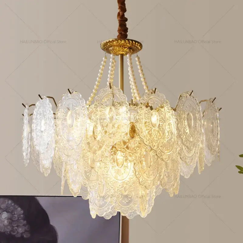 Elegant decorbites cream crystal chandelier with lace-like glass panels and pearl accents for luxury living room light