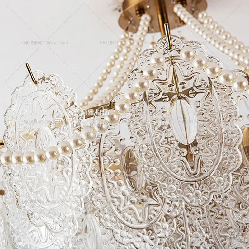 Elegant decorbites cream crystal chandelier with etched glass panels gold-toned accents and pearl strands for living room light