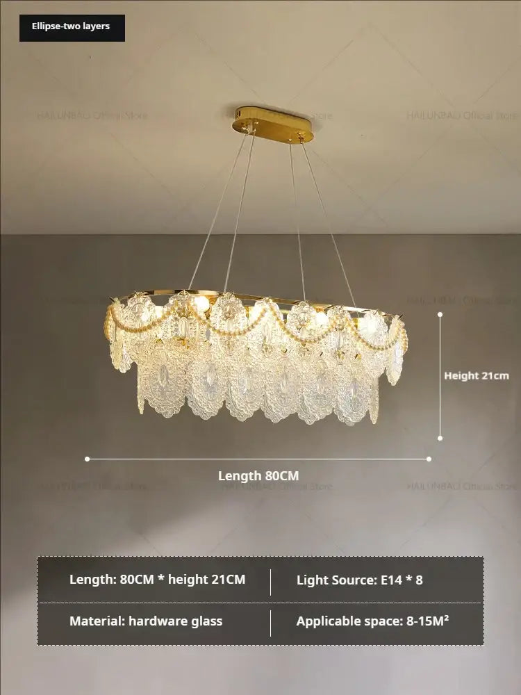 Gold-toned decorbites glass chandelier with two layers of lace crystal hardware for elegant dining room decor
